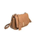 A camel quilted vegan leather crossbody bag with gold hardware. 