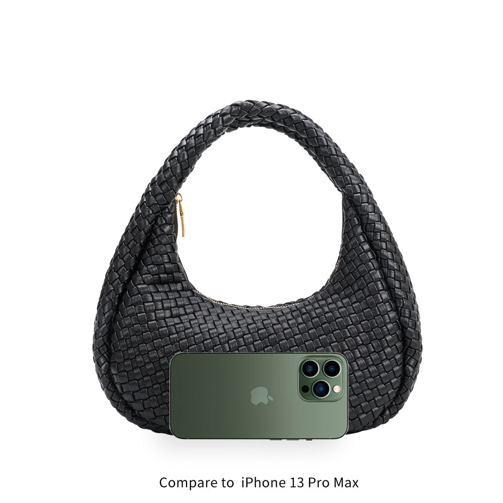 An iphone 13 pro size comparison image for a curved woven vegan leather shoulder bag.
