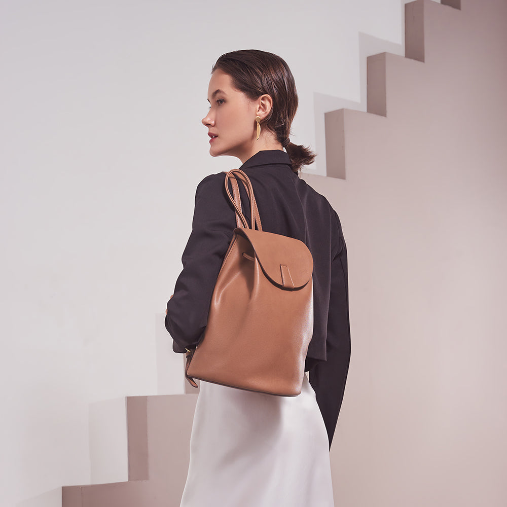 Model Wearing Melie Bianco Luxury Vegan Leather Aubrey Backpack in Mocha