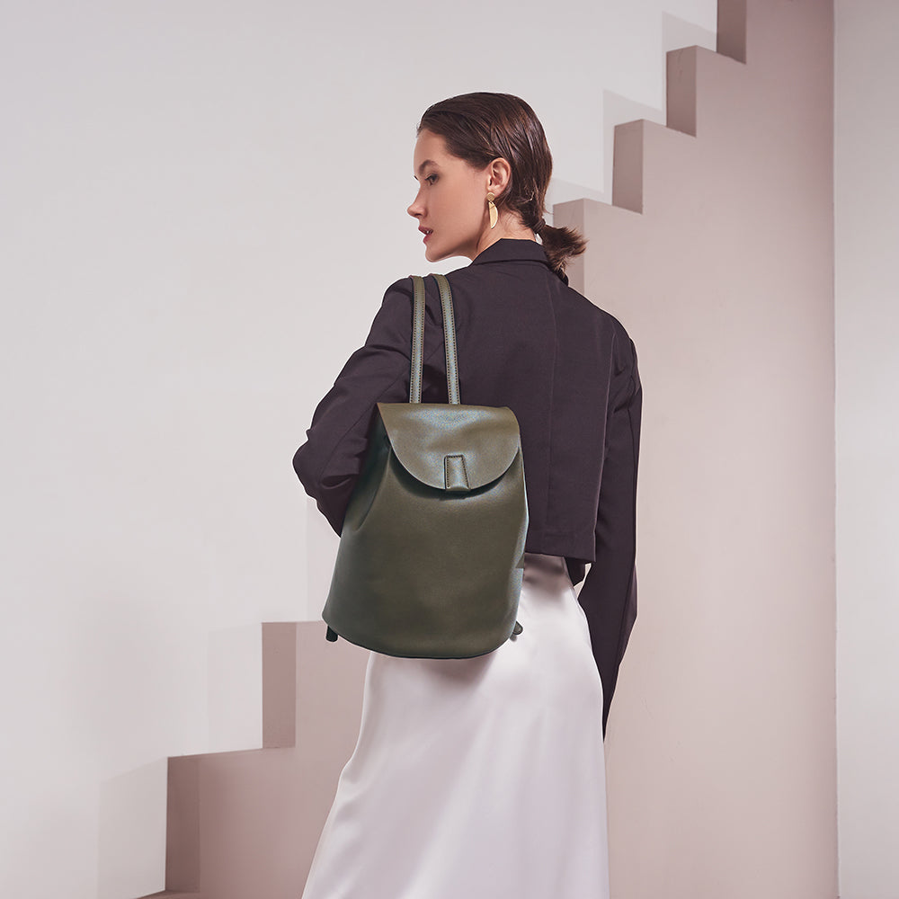 Model Wearing Melie Bianco Luxury Vegan Leather Aubrey Backpack in Olive